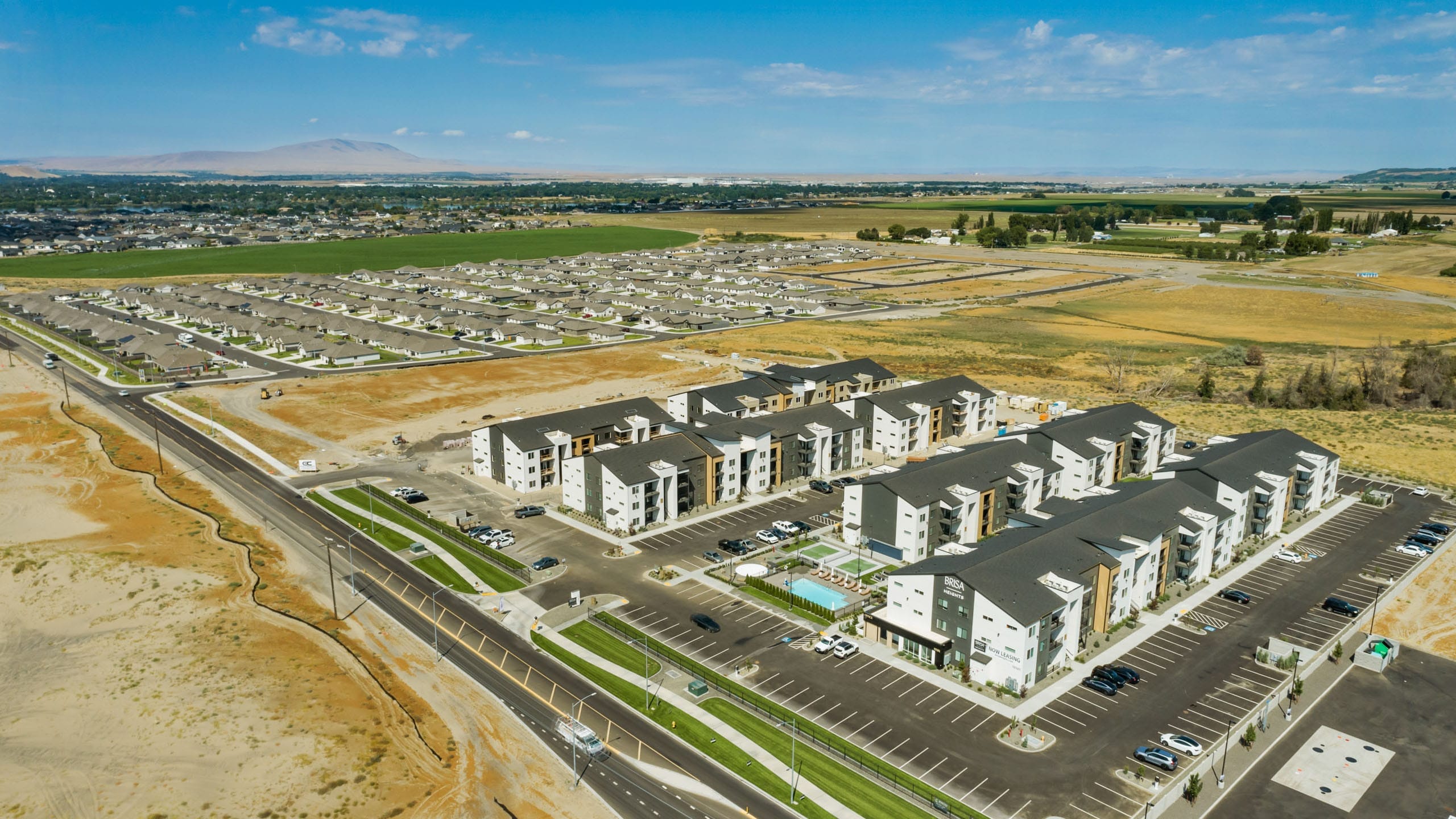 Aerial view of residential development with apartments.